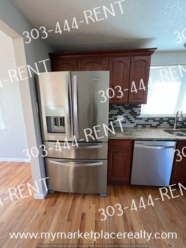 Photo - 5 Bedrooms & 2 Bathrooms walking distance to the Sheridan Light Rail Station!