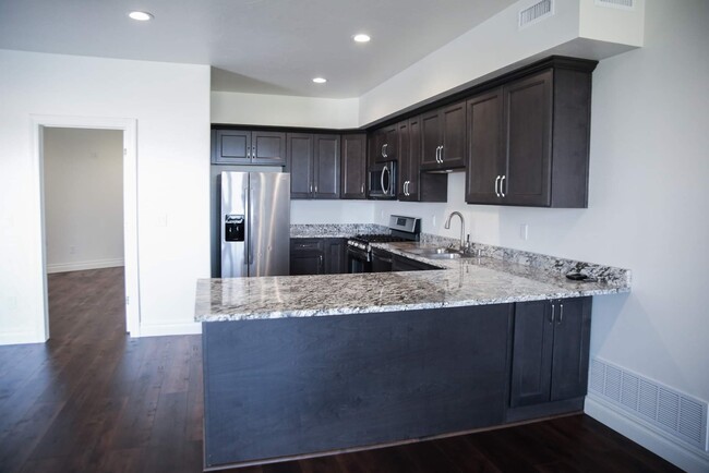 Kitchen - 555 N Sarah St Apartment Unit 555