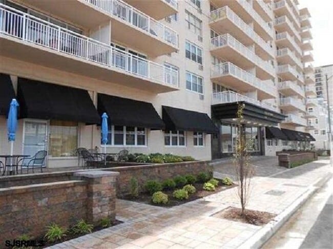 Building Photo - 9400 Atlantic Ave Unit 312