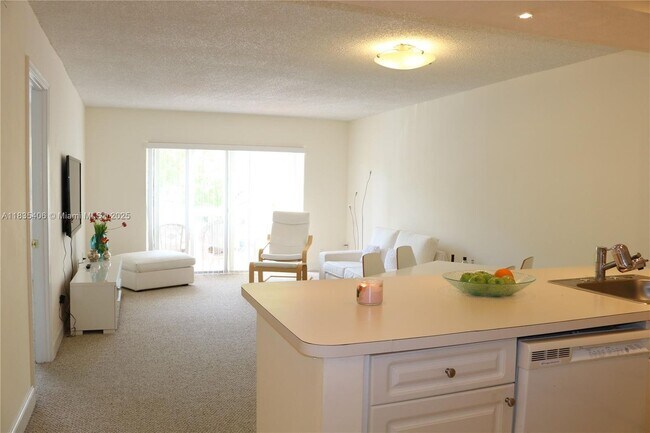 Building Photo - 7800 Camino Real Unit H209-H209 Rental