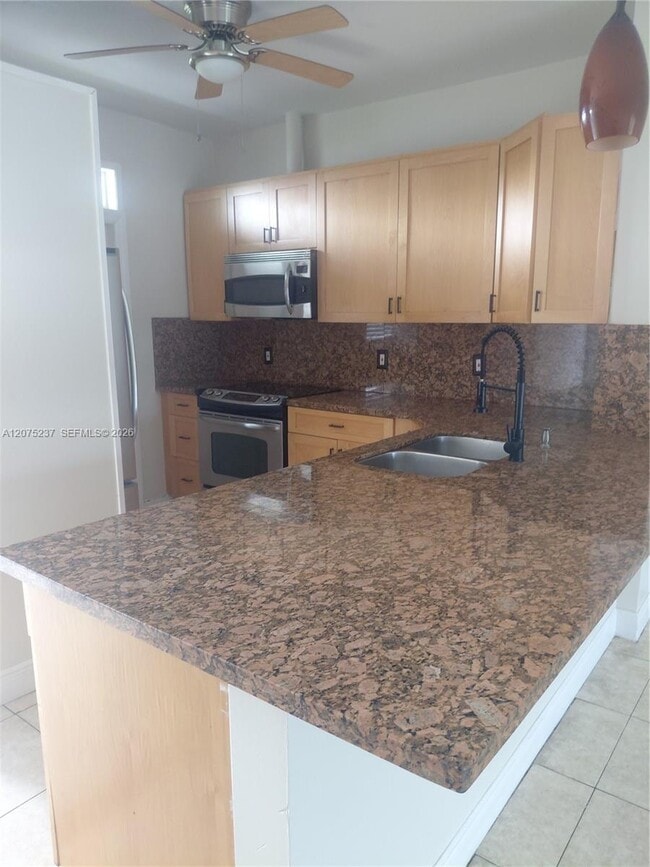 Building Photo - 5495 NW 10th Ct Unit 304