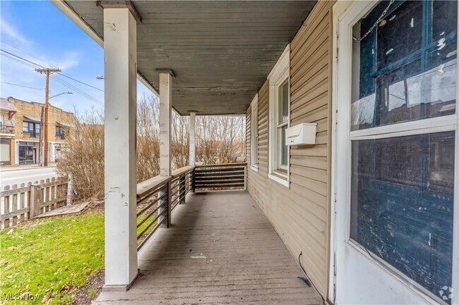 Building Photo - 7945 Lorain Ave Unit 1/DN Front Rental