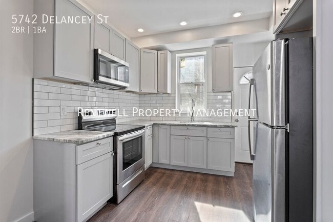Building Photo - 5742 Delancey St