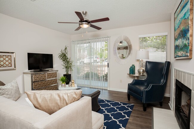 Living Room with Hardwood-Style Flooring - Arbors at Brookfield Apartments
