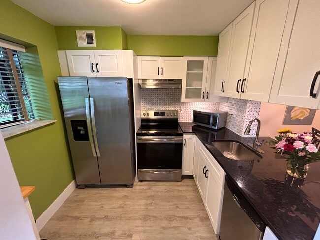 Photo - 2733 S Oakland Forest Dr Unit 104
