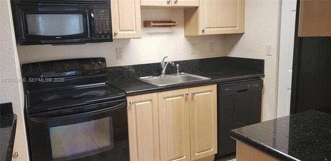 Building Photo - 10785 SW 108th Ave Unit 105