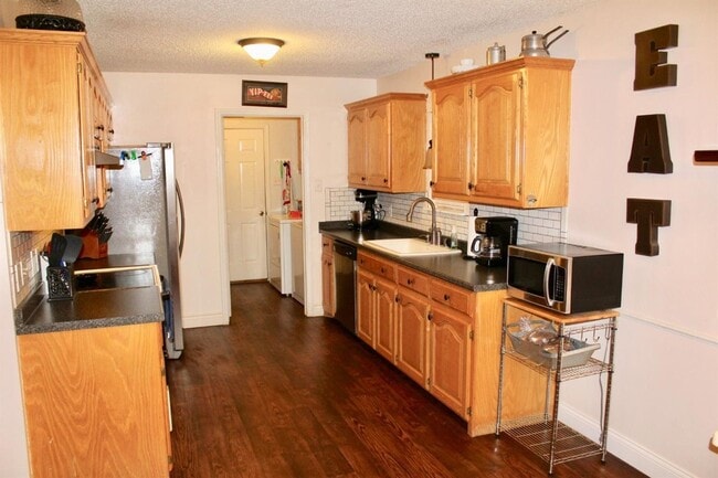 Photo - Available JULY 1st! Beautiful clean open concept home!