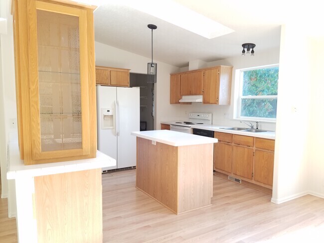 Spacious, bright kitchen, with skylight and a - 7614 81st Ave NW Rental