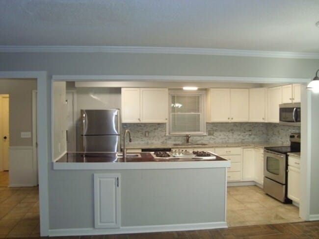 Photo - Renovated 4 bedroom available now to rent!