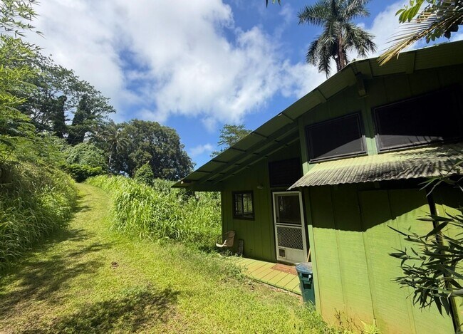 Photo - Remote riverside Kilauea cottage.