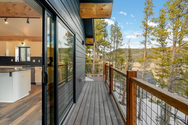 Photo - New Construction! Great Views! Deck! 20 minutes from Breck! In-floor radiant heat!