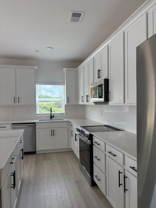 Photo - New Construction | Covered Deck + Open Living | Columbia, TN