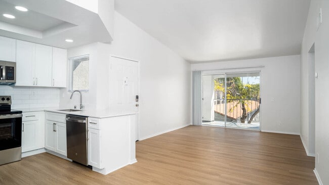 Living Room with Balcony and Hard Surface Flooring