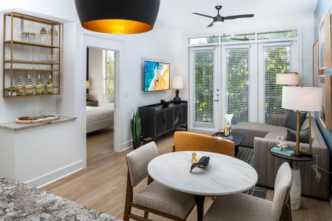 Lighted, modern ceiling fans in living and bedrooms