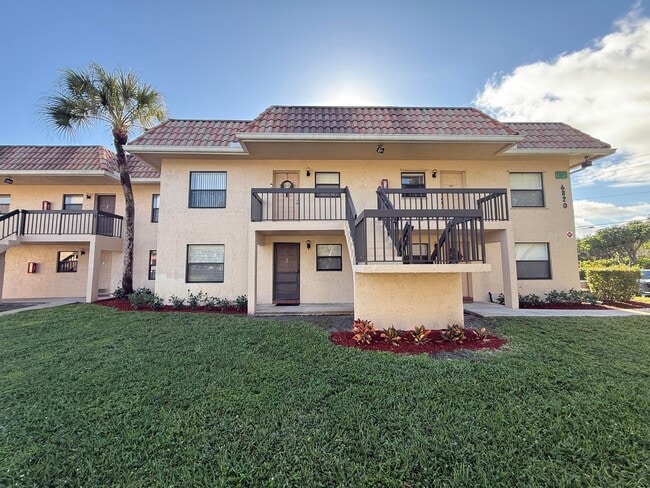 Building Photo - 6820 Palmetto Cir S Unit 103