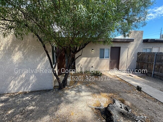 Building Photo - 2415 N Geronimo Ave Unit C