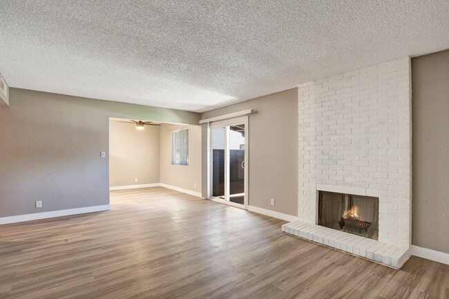 Open Living Space w/ Fireplace - The Edison Apartments