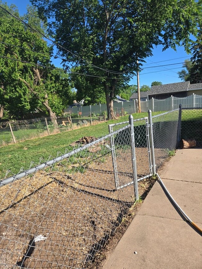 Photo - 2 Bedroom Home with Fenced Yard & Updated Flooring in Kitchen/Bath