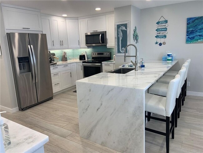 Building Photo - 133 N Pompano Beach Blvd Unit 507