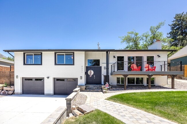 Building Photo - Exquisitely Renovated 4-Bedroom Oasis with Modern Upgrades