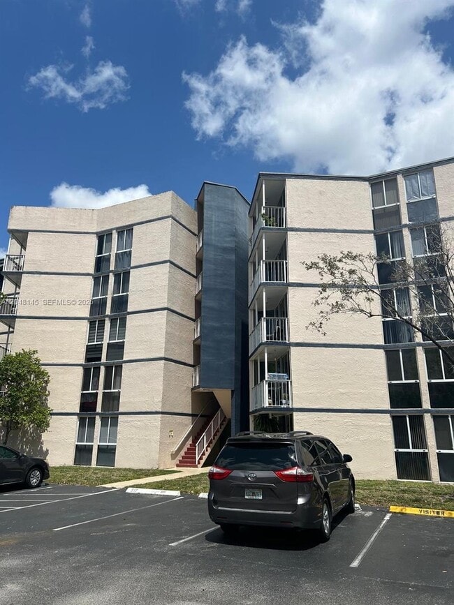 Building Photo - 6955 NW 186th St Unit F505