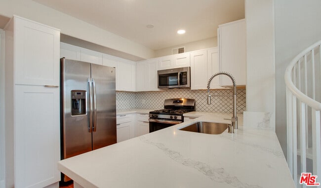 Photo - 5551 W 6th St Unit 3-415