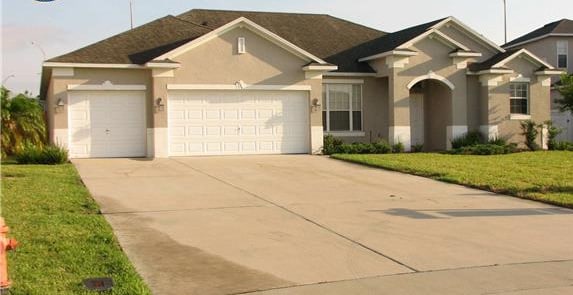 Building Photo - Spacious 4-Bedroom Pool Home with 3-Car Ga...