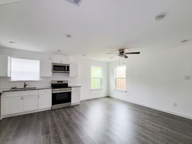 Photo - This newly constructed 3-bedroom, 2-bathroom unit offers modern living with 1,150 sq ft of space....