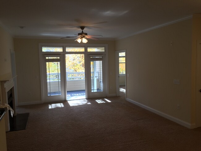 Living Room ( fire Place, Door to Porch) - 2810 Bedford Green Dr Unit Bedford Green 105