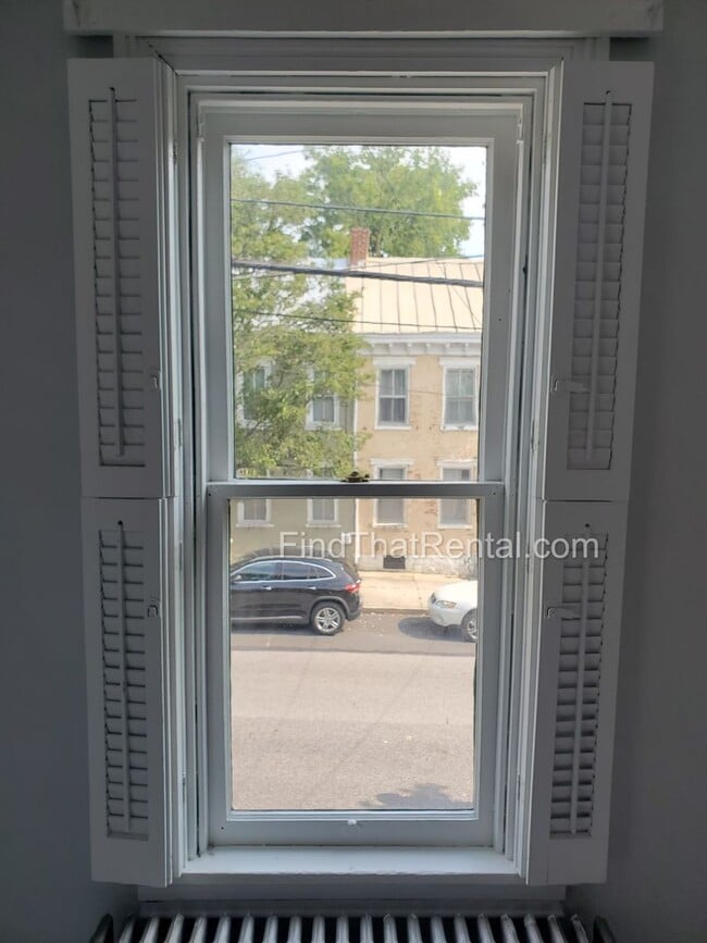 Photo - Charming Historic Retreat with Private Fenced Yard & Parking – Prime Downtown Location