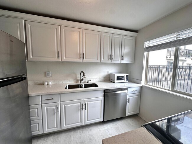 Photo - Updated 2-Bedroom Condo with Water Views, 2 Parking Spaces & Poolside Location Unidad 203