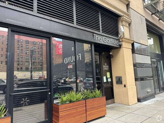 Building Photo - Modern 1-Bedroom Condo in the historic Gar... Unit 501