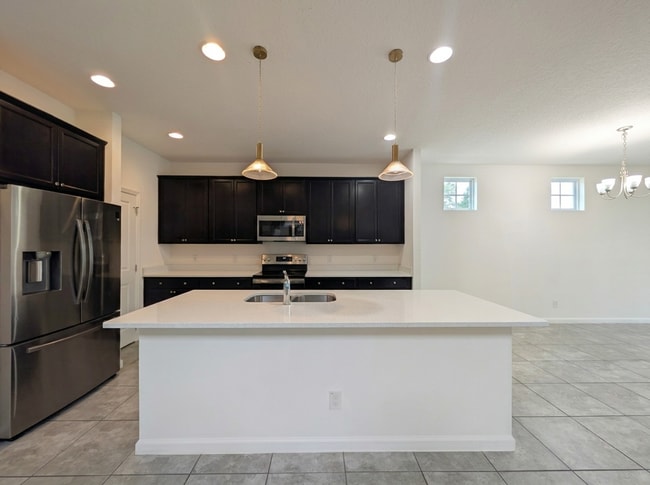 Photo - Move-In Ready 4-Bed in Silver Oak, Quartz Kitchen and Community Pool