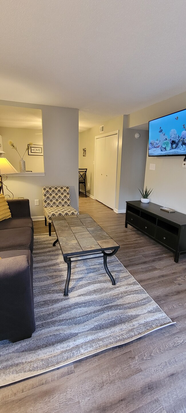 Living Room, view from front door, ground level entrance. - 1522 Parkway Condo Unit E2