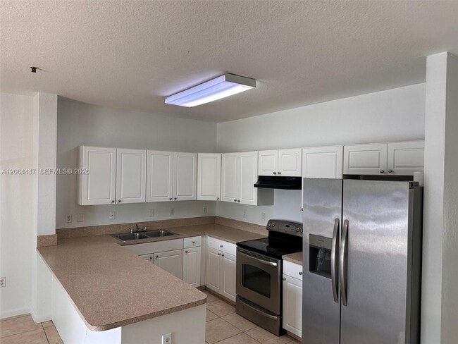 Building Photo - 17350 NW 67th Ave Unit 205