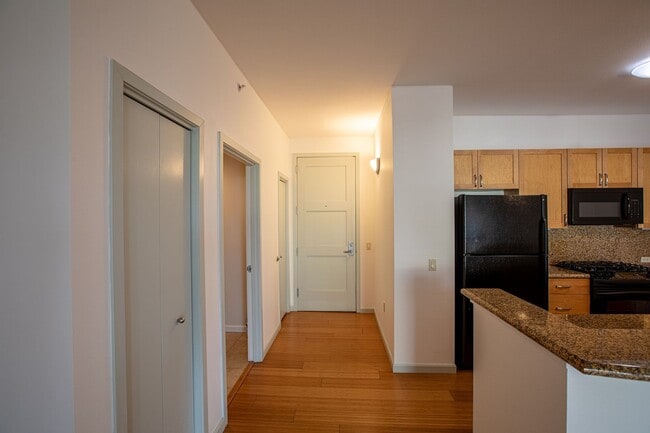 Photo - Sweet + secure 1/1 condo with parking, extra storage room + AC available now! Unit 206