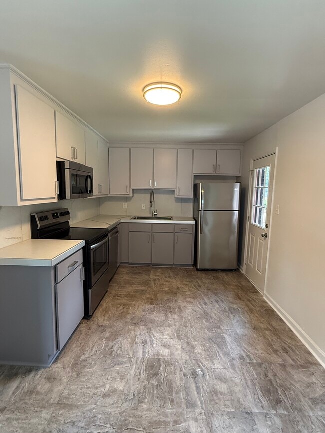 Kitchen with entry to backyard
