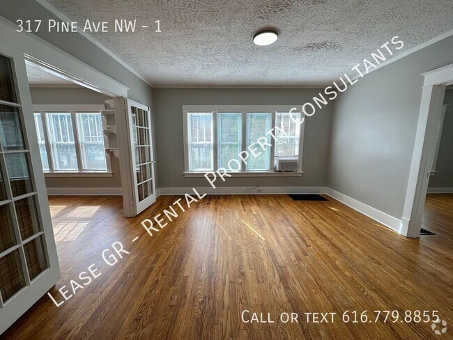 Building Photo - Updated lower 2 bedroom on the West side o... Unit 1 Rental