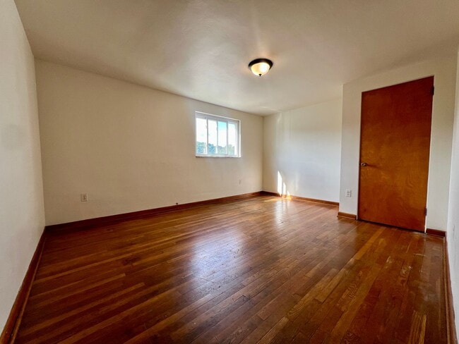 Photo - Cozy Two Bedroom Townhome with Central AC & Off-Street Parking! Call Today to Schedule a Tour!