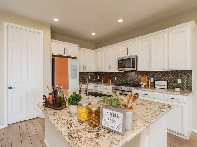 Photo - Amazing 4BR 2.5BA Home w/ 3-Car Tandem Garage • Pool Access • Yard w/ Fire Pit in Saguaro Trails