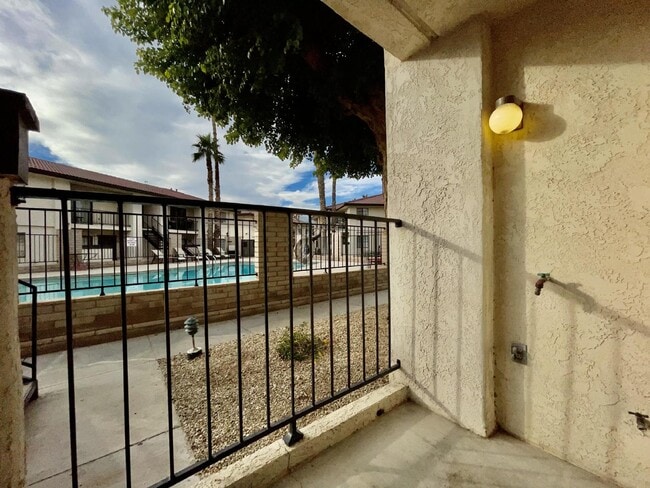 Photo - Gated community with a pool, 2 bed 1 bath $975 rent. Unit A7