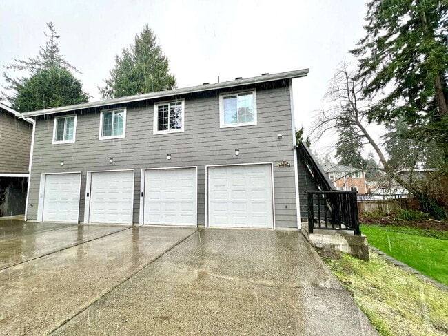 Photo - Elevated 3-Bedroom Home with Secure Garage & Cozy Living Space Unit C