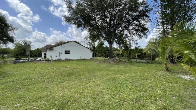 Photo - Spacious 3-Bedroom Oasis in Loxahatchee with 2 Full Baths
