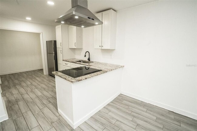 Photo - 1007 E 32nd Ave Unidad 1/2