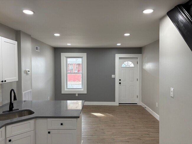 Photo - Newly Renovated 2- Story Townhome with Front Porch and Back Yard