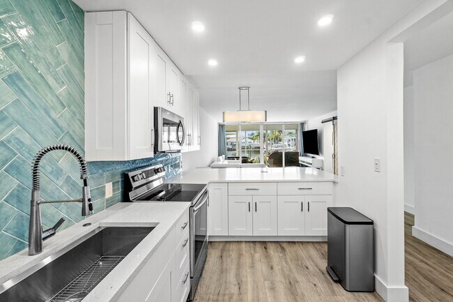 Photo - 698 NE Spanish River Blvd Unit 0140