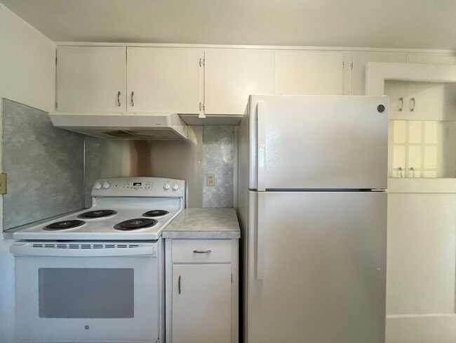 Photo - Charming 2-Bedroom Home with Open Living Space and Tile Flooring