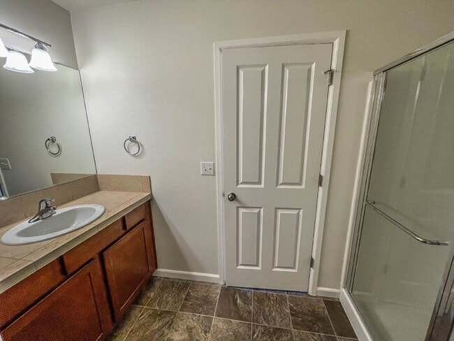 Photo - 3 Bed 2.5 Bath 2 Car Garage 1493sf Low maintenance yards. Prime Location.