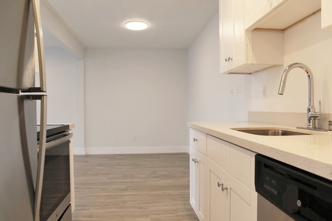 View from entryway looking into kitchen and dining!