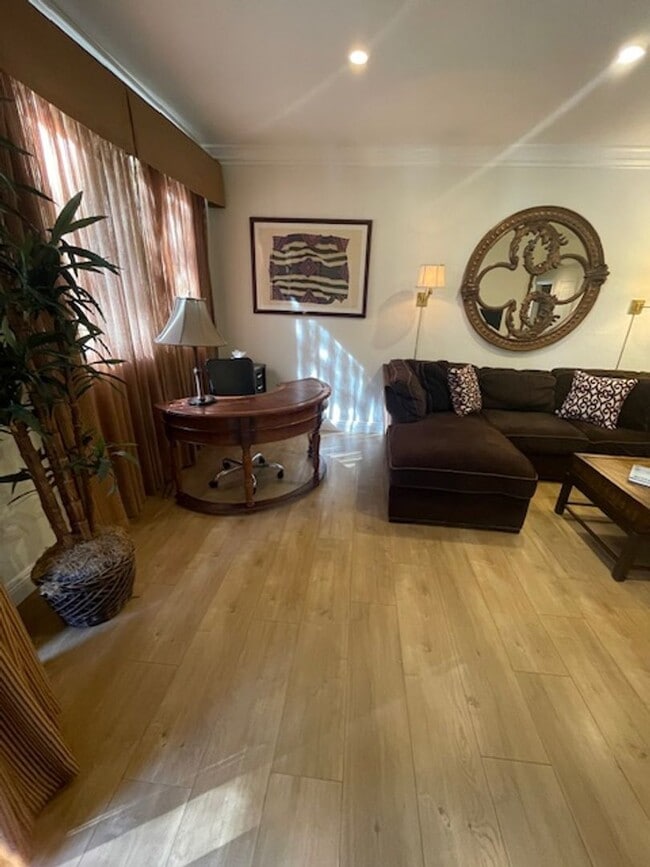Photo - Meridian 2 Bd / 2 Ba with Laminate Flooring in Living Room & Bedroom Areas
